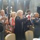 Proud mom Mia Farrow snaps photos of her son Ronan as he is photographed onstage with other Pulitzer Prize winners.